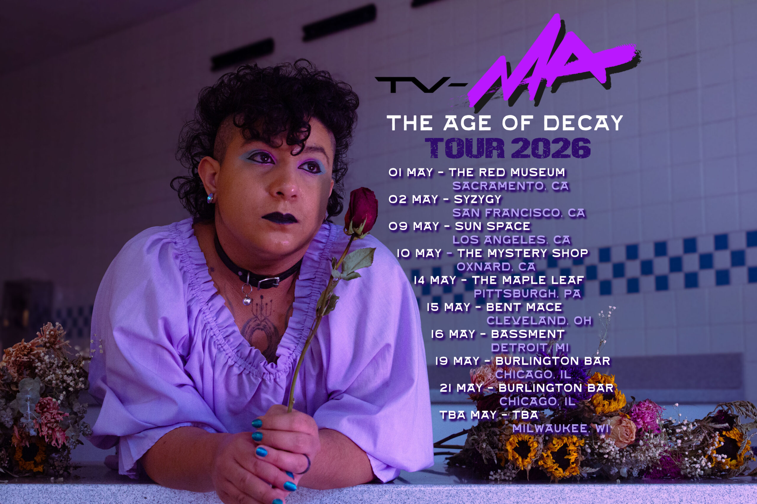 Flier of me surround by dried flowers, holding a dried rose. I'm sitting on the counter of an abandoned food stall, covered in white and blue tile. The text of this flier is info about my tour dates in may around SoCal, NorCal, and the Midwest.